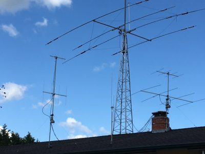 The antenna, rotor, and tower in the center are for sale.